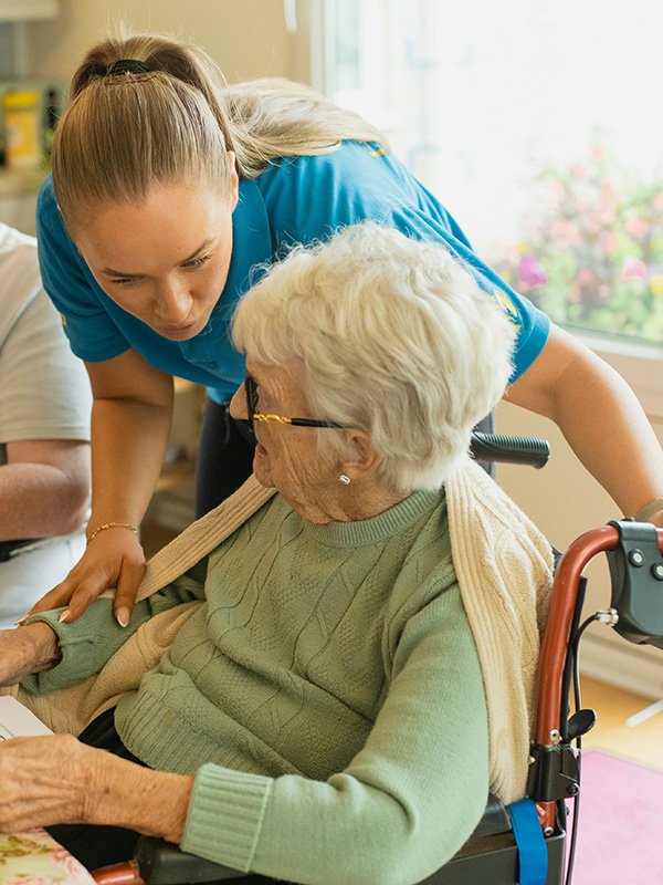 Caregiver and elderly woman