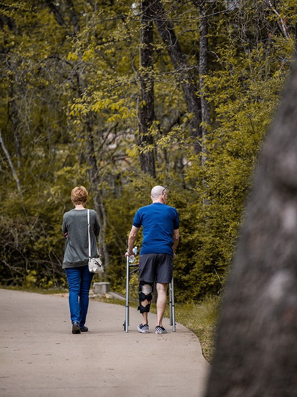 Elderly couple walking