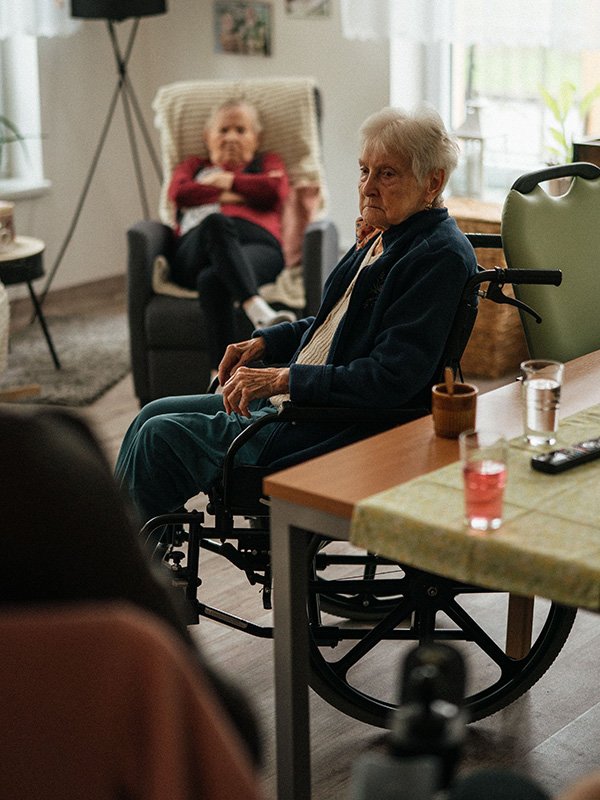 Elderly lady in wheelchair